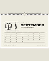 British Weather Club 2027 wall calendar, September page with coat and umbrella on a rail
