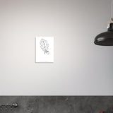 Oak Leaf line art A3 print on a wall beside a black pendant lamp