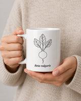 Beetroot mug held in two hands