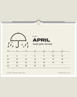 British Weather Club 2027 wall calendar, April page with umbrella in rain and hail