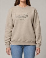 Coastline sweatshirt in Sand, worn by a model, studio photo