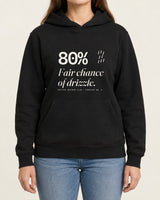 Fair Chance of Drizzle hoodie in Black, worn by a model, studio photo