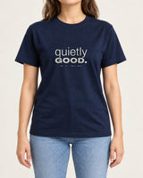Quietly Good tee in Navy, worn by a model, studio photo