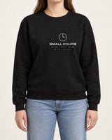 Small Hours sweatshirt in Black, worn by a model, studio photo