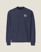 Core long-sleeve tee in Midnight Blue, front view with the embroidered chest mark